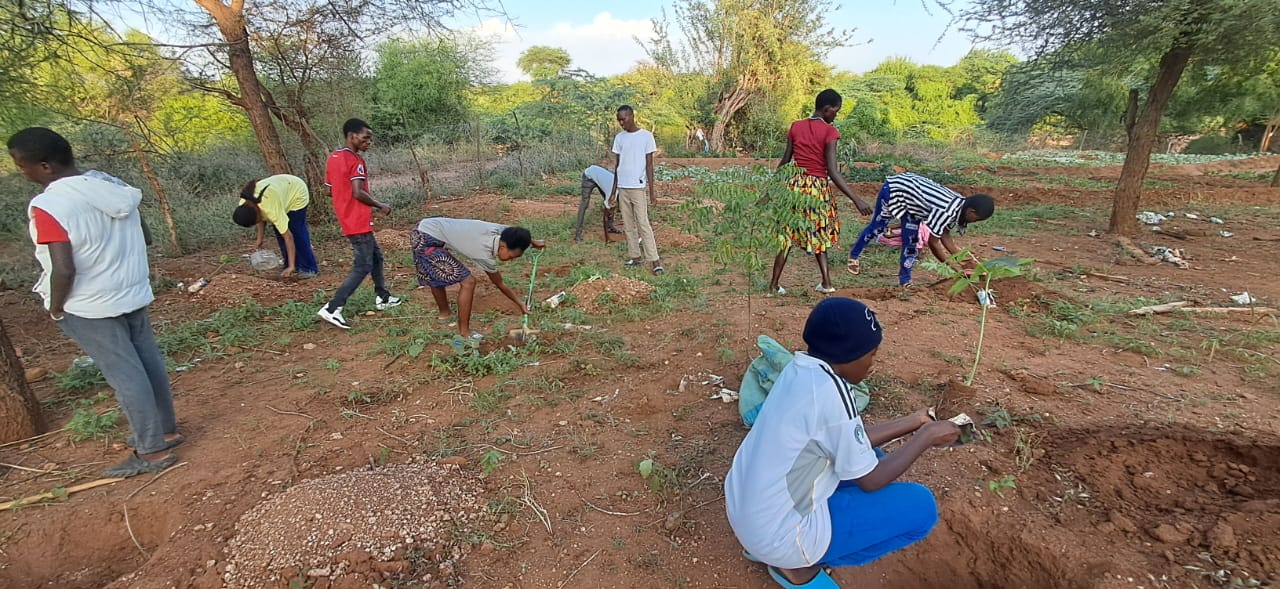 Young volunteers working together on a community project